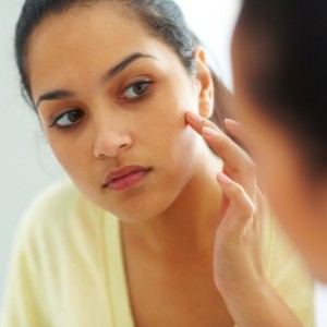 Why does my face break out when I'm sick?