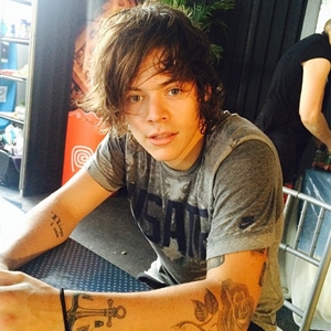 Copying sleek hairstyles from One Direction